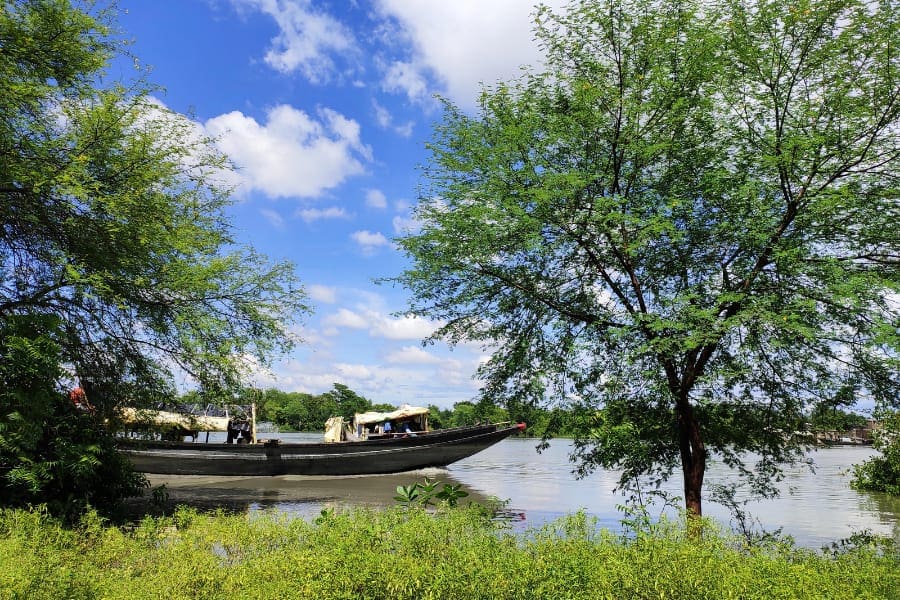 a river with boats at Sundarbans
